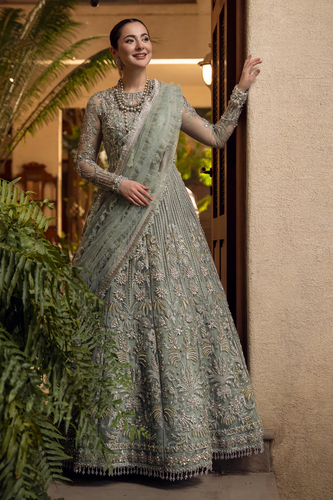 Swarovski Story tea green lehnga set